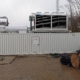 Batteriespeicher (600 kW, 700 kWh), 2 BHKW (je 550 kW el.) sowie ein Dieselaggregat (1.200 kW) in Containerbauweise